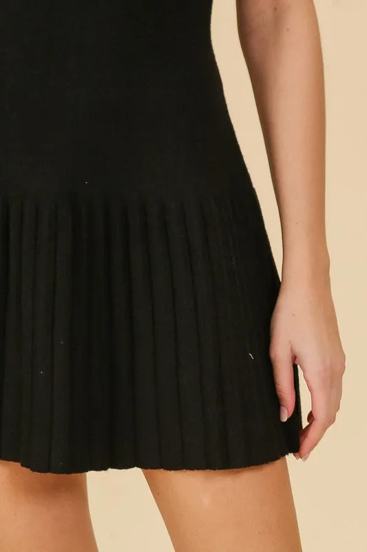 Black sleeveless pleated dress